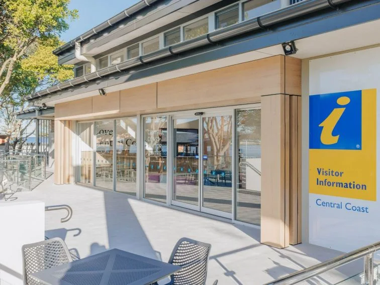 Central Coast Visitor Centre entrance on Marine Parade with its visitor information sign
