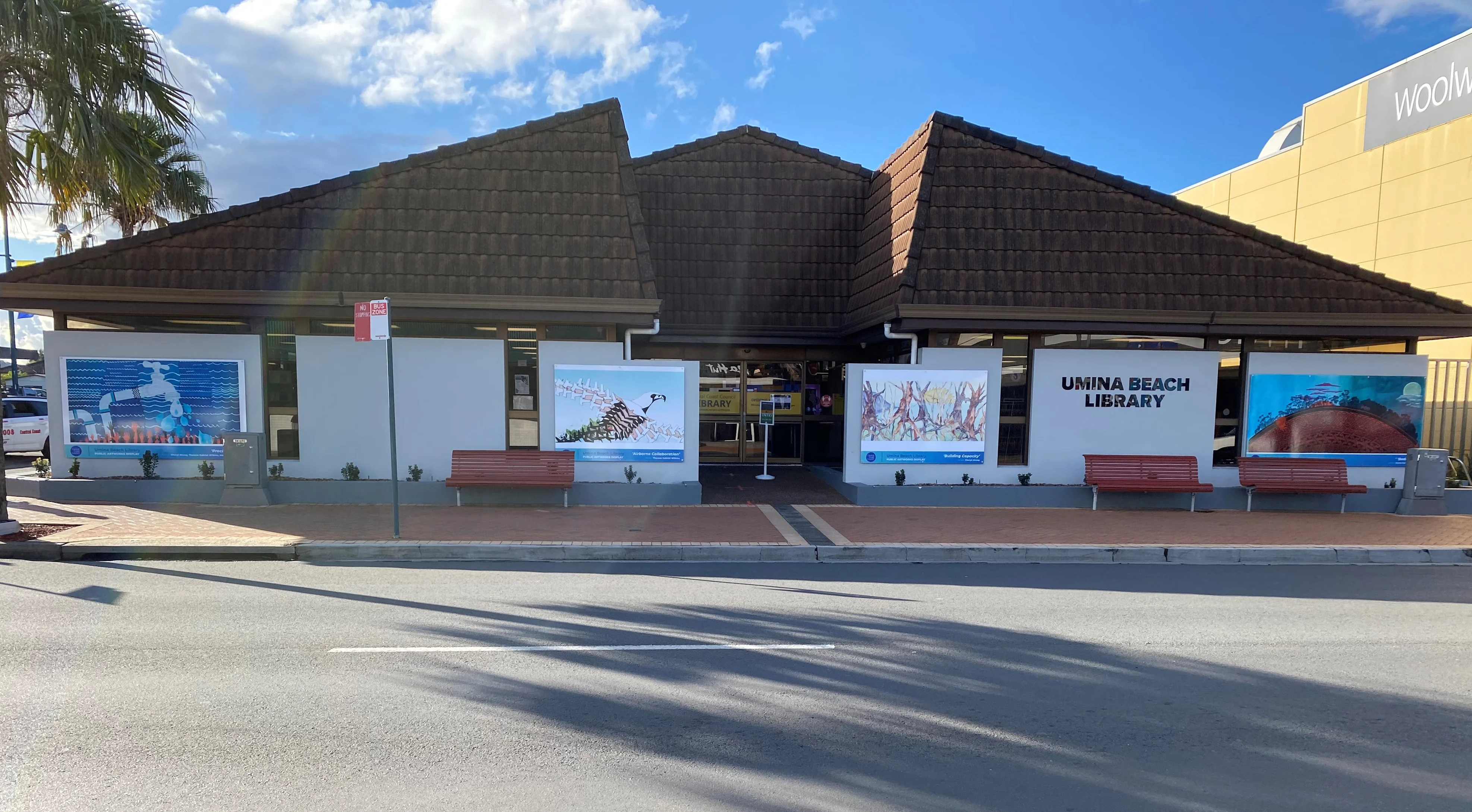 Umina Beach Library exterior with local historical artwork displayed across its frontage