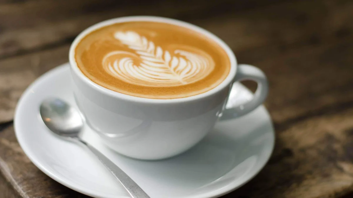 Latte with leaf-pattern coffee art served at Fibonacci Coffee Wyong